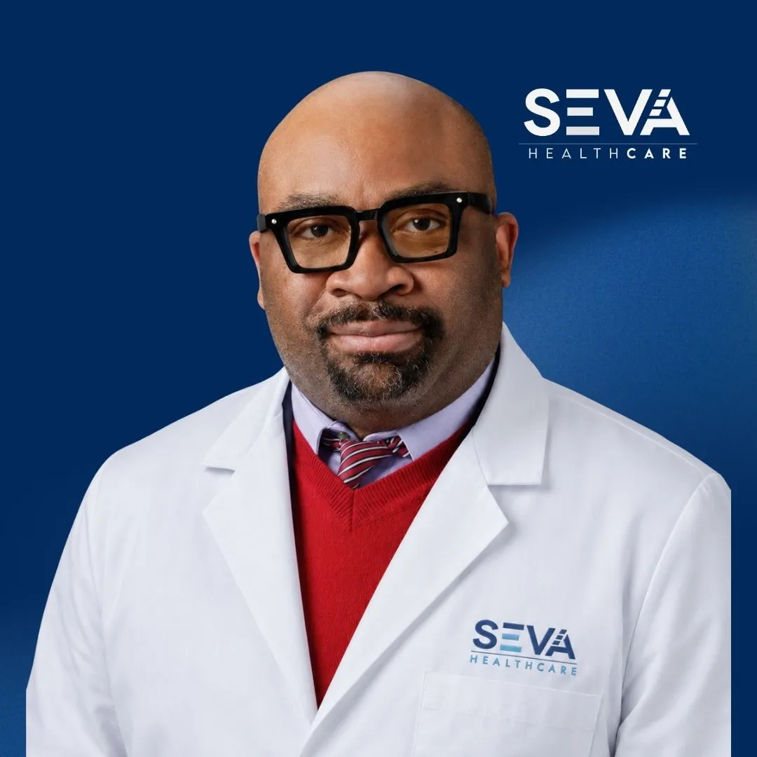 Dr. Babajide Ogunseinde, MD, FAAOS, ABPS — Harvard-trained orthopedic spine surgeon at SEVA Healthcare with 15+ years experience and 8,000+ procedures